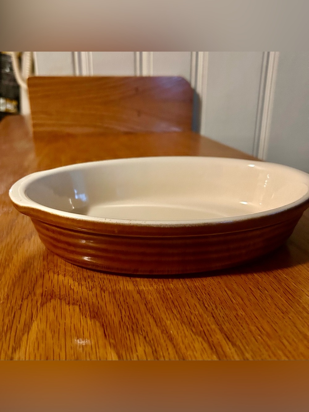 Emile Henry France caramel brown ribbed 6 1/2” W x 9 1/2”L oval baking dish